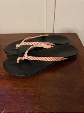 OluKai Black Flip-Flops with Pink Striped Straps size 11